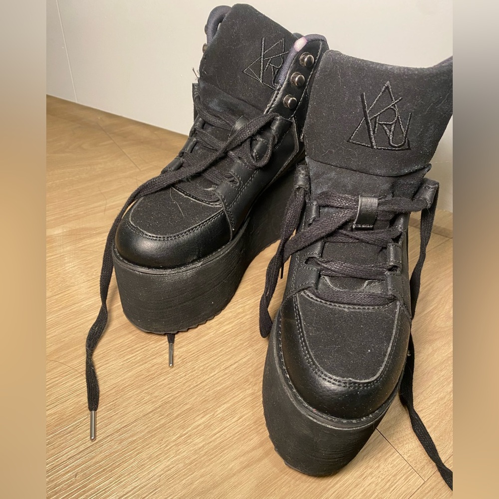 Black platform sneakers